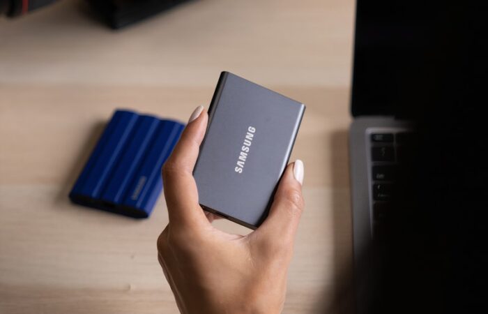 a hand holding a phone