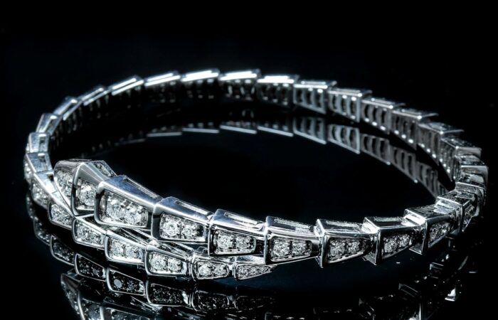 a diamond bracelet on a black background